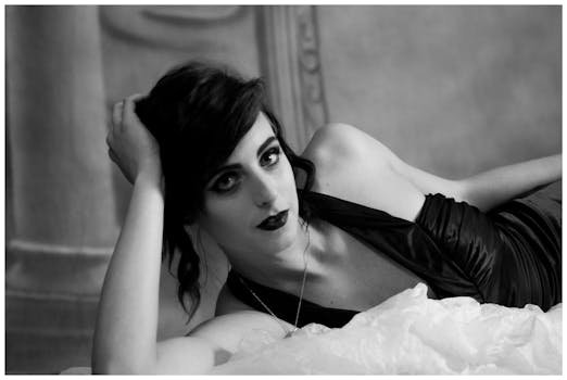 pexels-photo-736415-736415 Charming portrait of a woman in an elegant black dress, conveying glamour and sophistication.